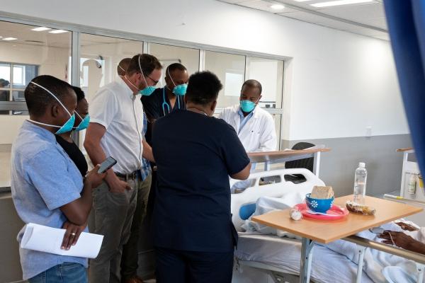 Doctors doing rounds on an MDR-TB patient